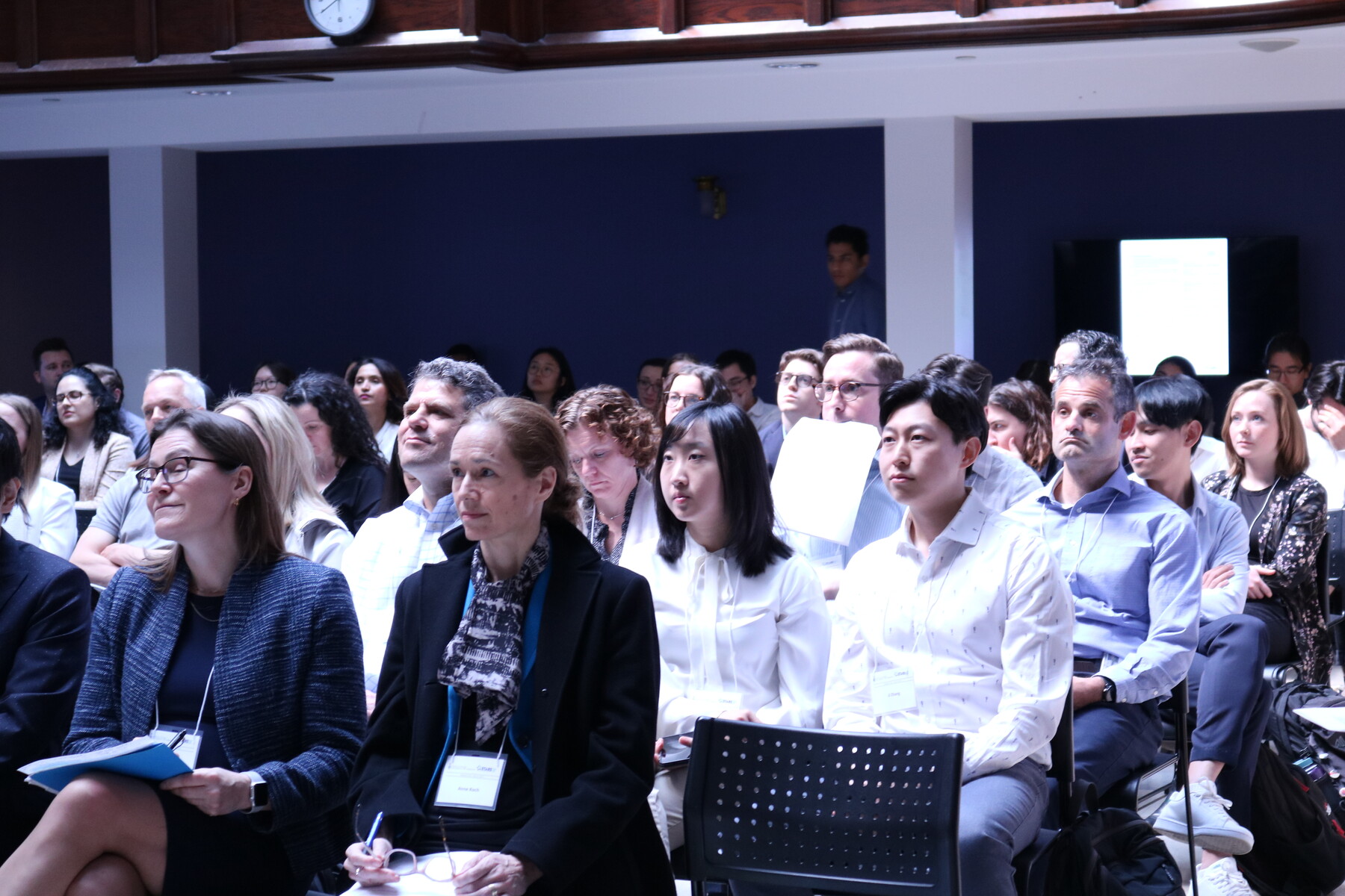 Audience of researchers, faculty, and trainees from the UofT Department of Radiation Oncology listening to the research oral presentations being presented at our UTDRO & STARS21 Research Day 2023 event.