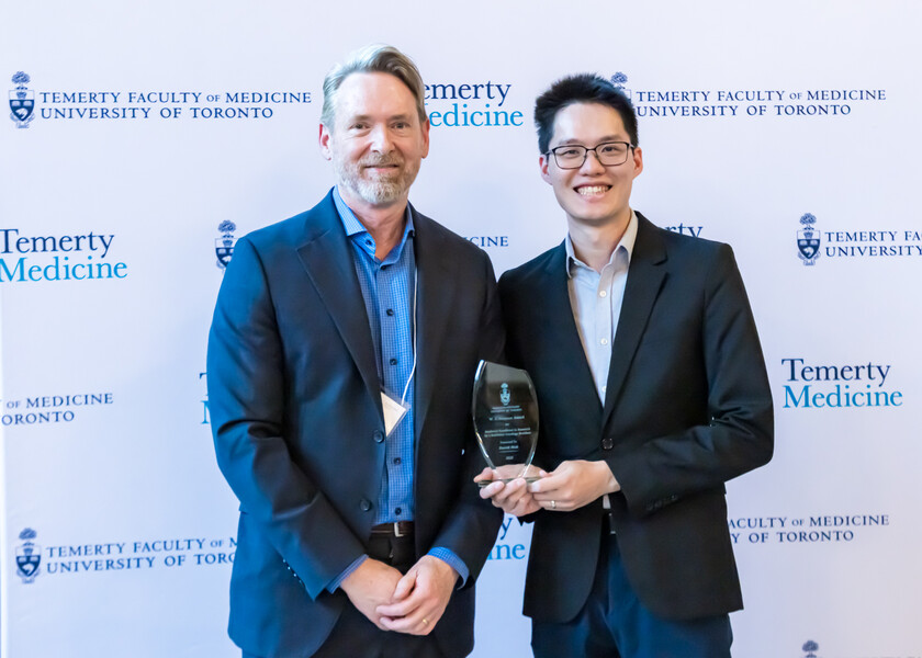 David Hodgson, Vice Chair of Research, presents the W. J. Simpson Award for Academic Excellence in Research by a Radiation Oncology Resident to David Mak.