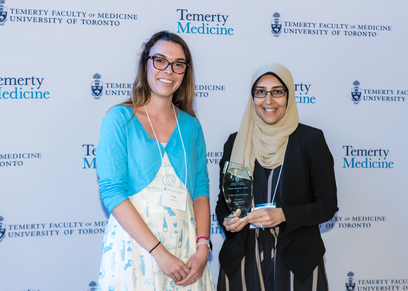 Sarah Aubert, Chief Physics Resident, presents the Physics Residents’ Award for Excellence in Physics Teaching to Alyaa Elzibak.