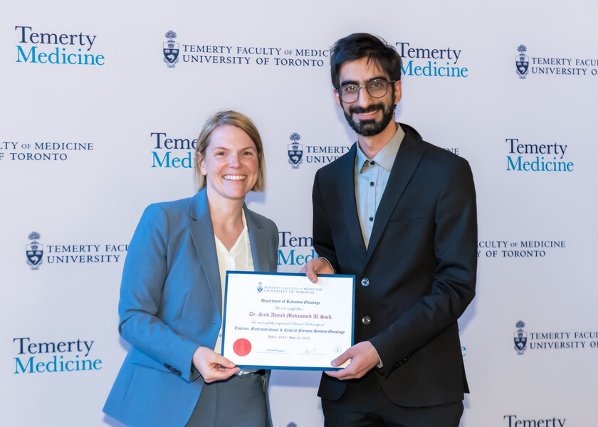 Jennifer Croke, Director of the Radiation Oncology Fellowship Program, presents the graduation certificate to Said Al Saifi.