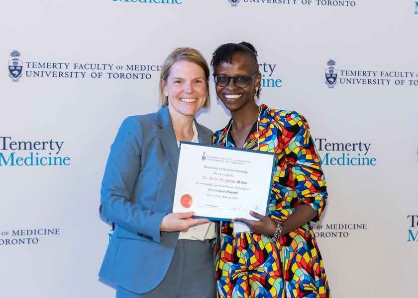Jennifer Croke, Director of the Radiation Oncology Fellowship Program, presents the graduation certificate to Juliet Maina.