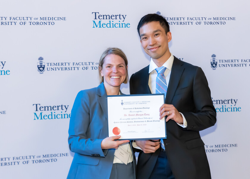 Jennifer Croke, Director of the Radiation Oncology Fellowship Program, presents the graduation certificate to Daniel Tong.
