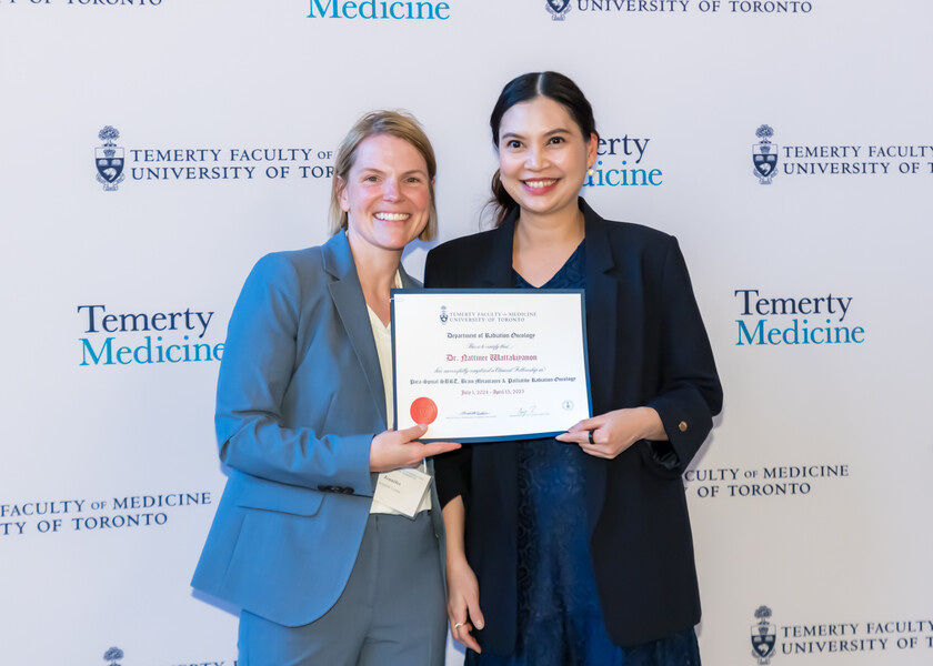 Jennifer Croke, Director of the Radiation Oncology Fellowship Program, presents the graduation certificate to Nattinee Wattakiyanon.
