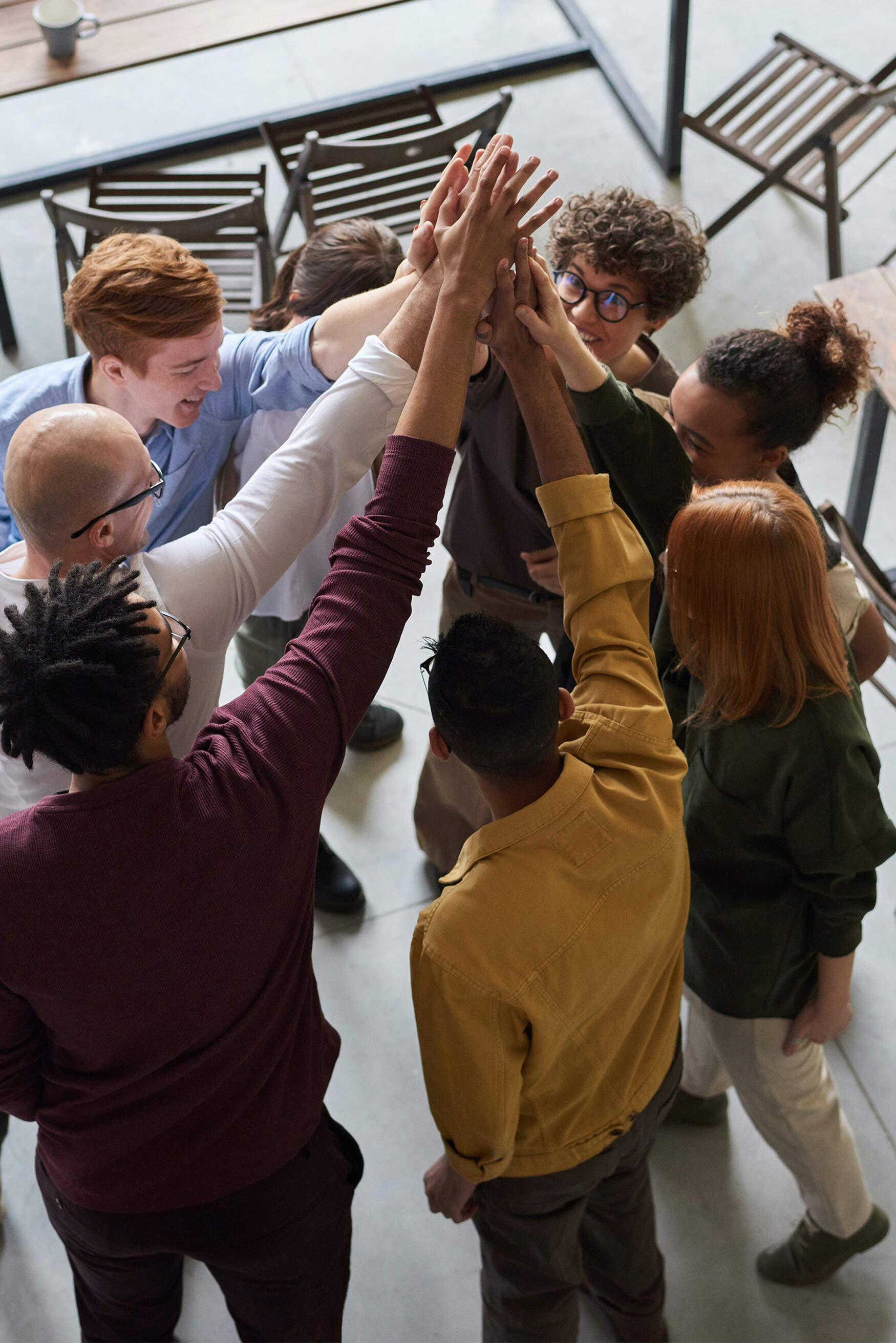 Diverse team high five