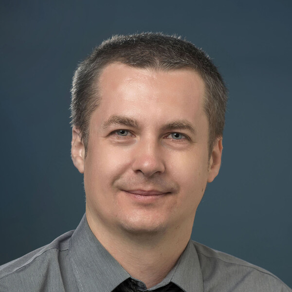 Headshot of Alex Karotki