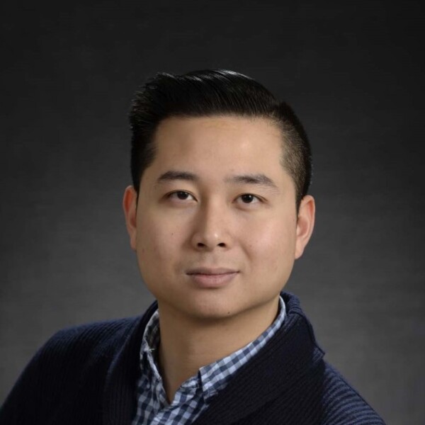 Headshot of Michael C Tjong