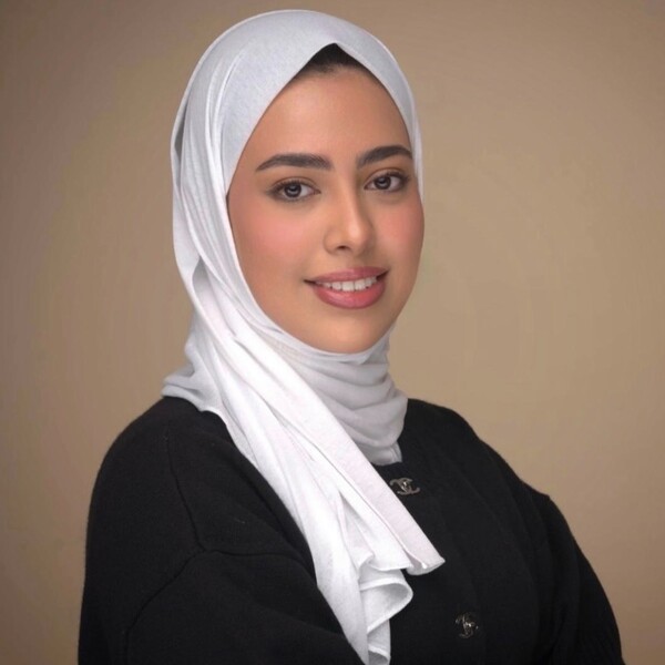Headshot of Moudhi Sadan